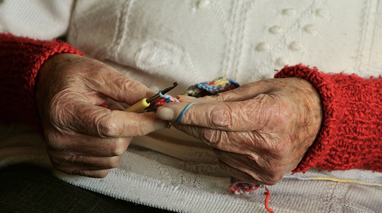 a resident knitting