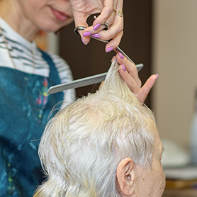 resident-having-a-haircut