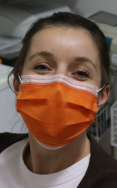 a nurse wearing a mask