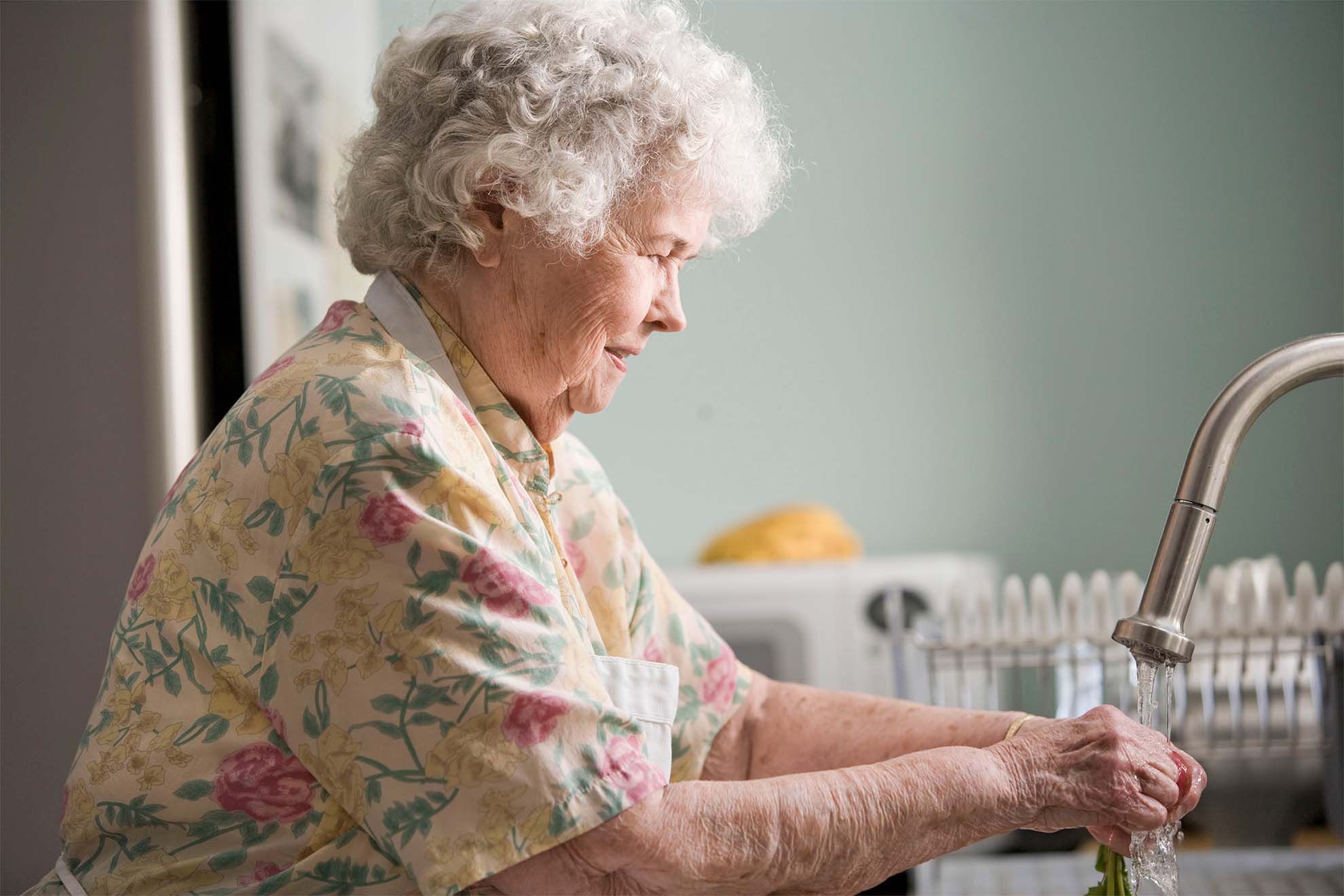resident-washing-her-hands