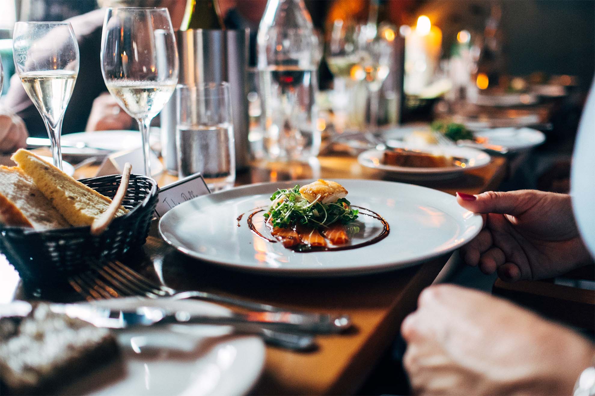 dining table with food and cutlery arranged