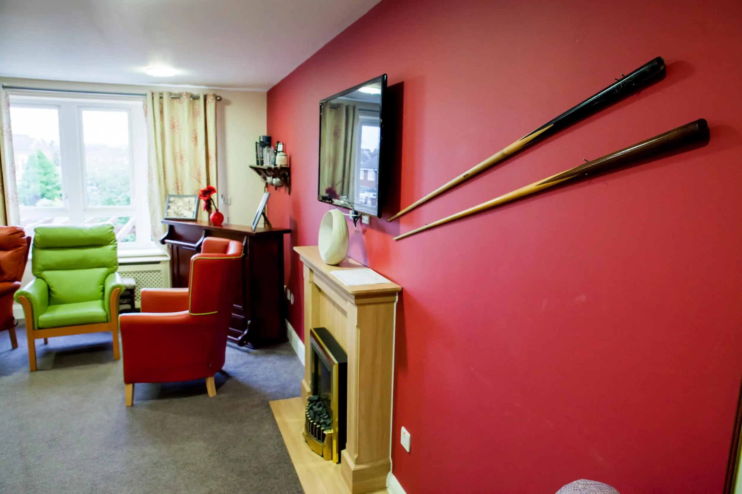 lounge-room-with-seats-a-fireplace