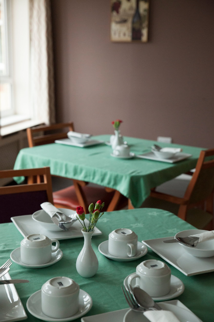 Dining table with green table cloth