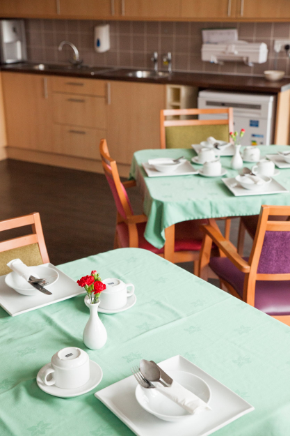 Dining table with green table cloth