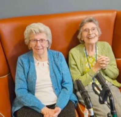 residents smiling at entertainment